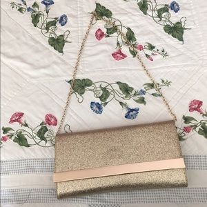 ALDO Gold glittery clutch