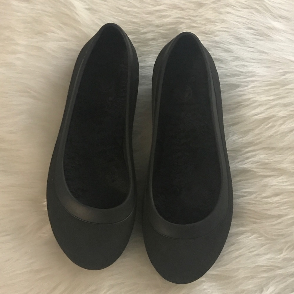 Crocs black flats, very comfortable.