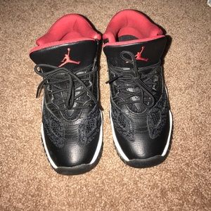 Red/black Jordan 11s