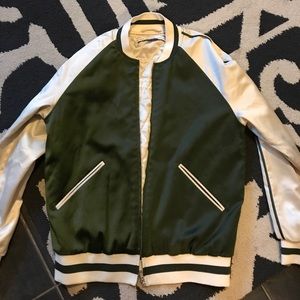 Green and white track jacket