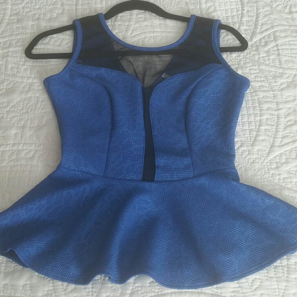 Super cute blouse with sheer front design