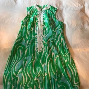 Green Lilly Pulitzer dress with white detailing.