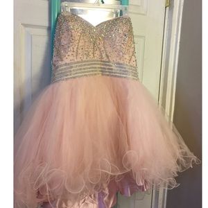 Short light pink puffy jeweled corset dress