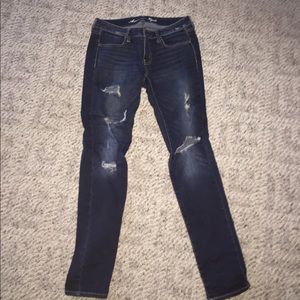 Dark blue ripped jeans