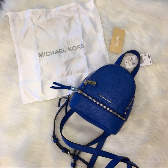 Michael Kors Handbags - Michael Kors Rhea Zip XS Backpack Blue