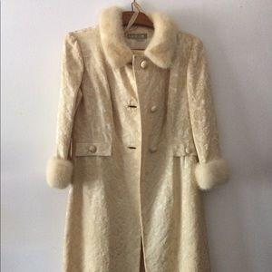 White dress and matching coat.