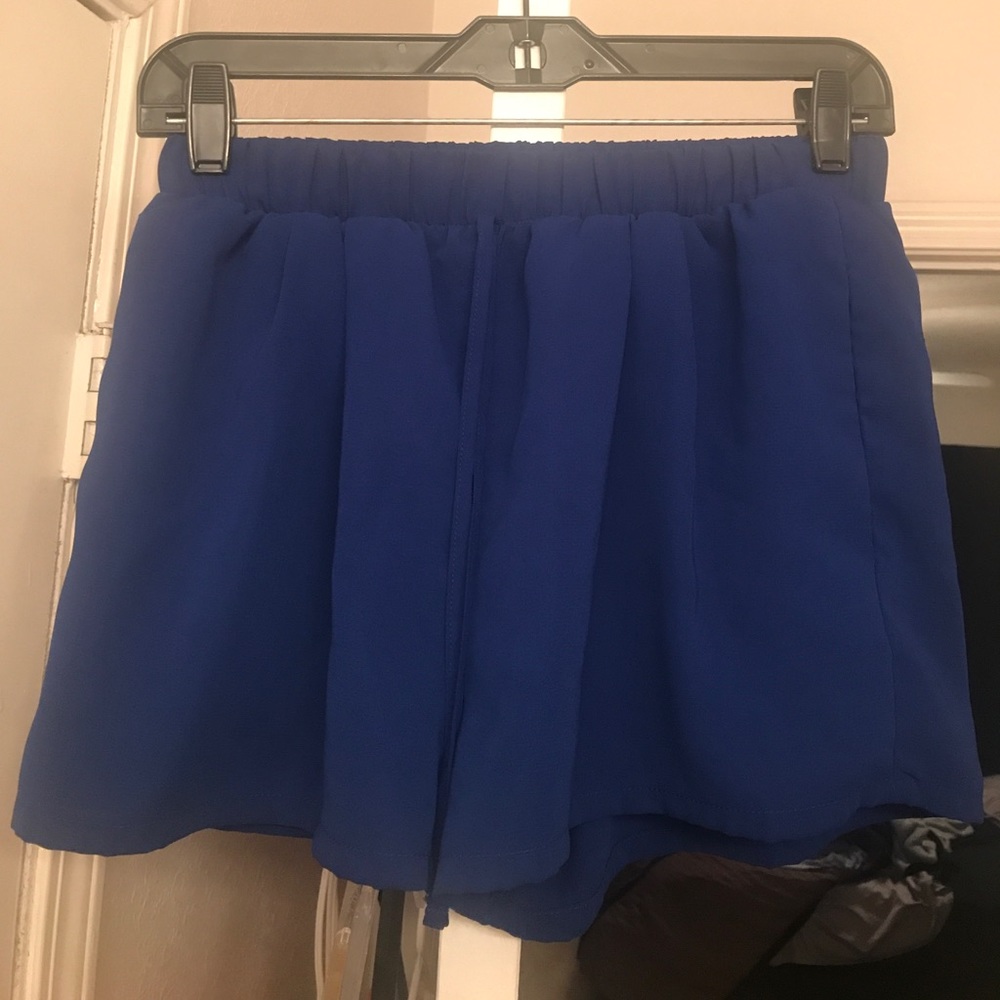 Blue drawstring parachute shorts