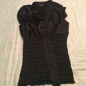Black dressy top ...to really show off your waist.