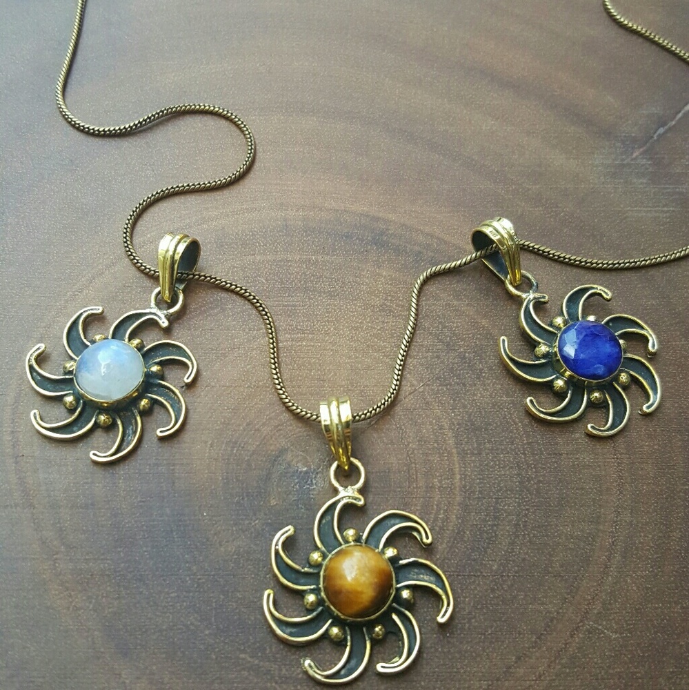 3 pendants, chain included .