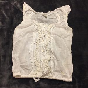 White sleeveless top