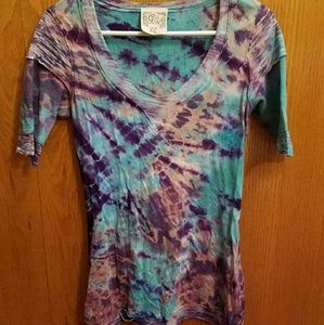 Tye-dye shirt from the buckle.
