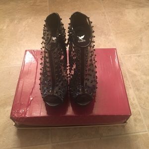 Black Platform Clear Shoes.