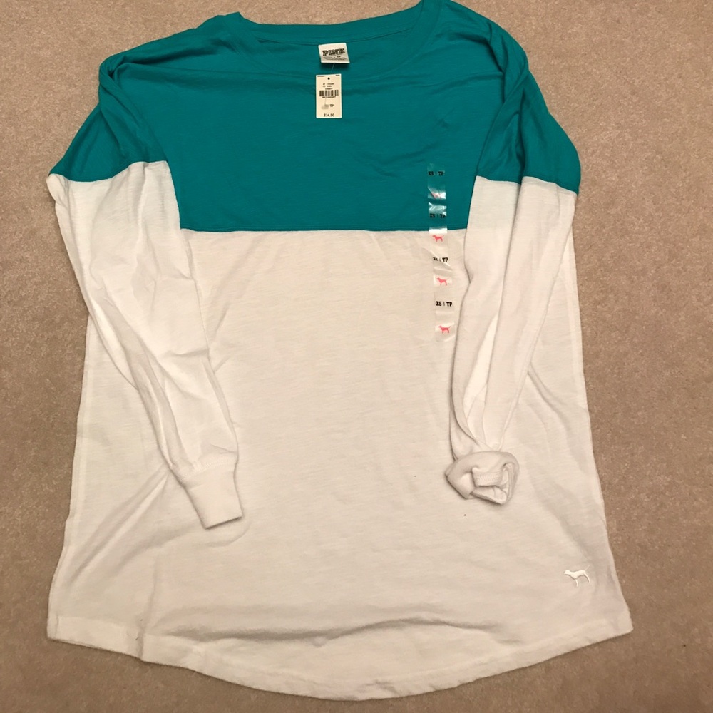 Pink long sleeve t shirt. New. Size XS.