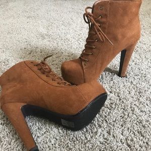brown lace up Boots.