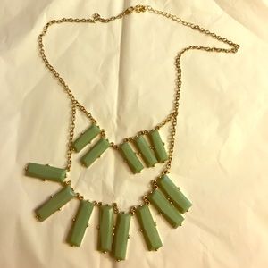 Gold necklace with jade green detail