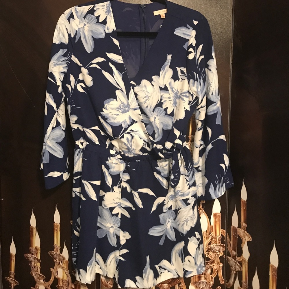 Navy blue floral long sleeved romper