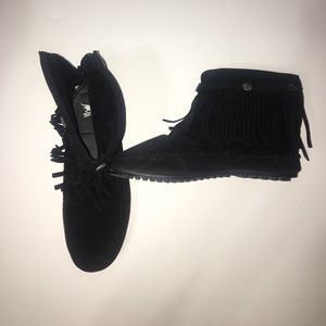 One pair of black moccasins