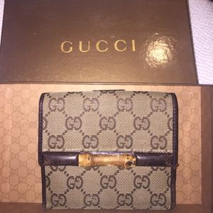 Authentic gucci bamboo hardware wallet.