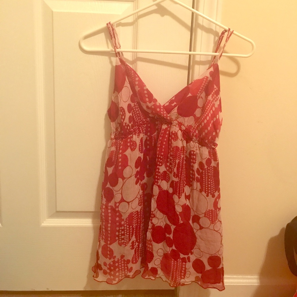 Red and off-white spaghetti strap shirt.