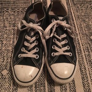 Worn black low top converse women's size 7