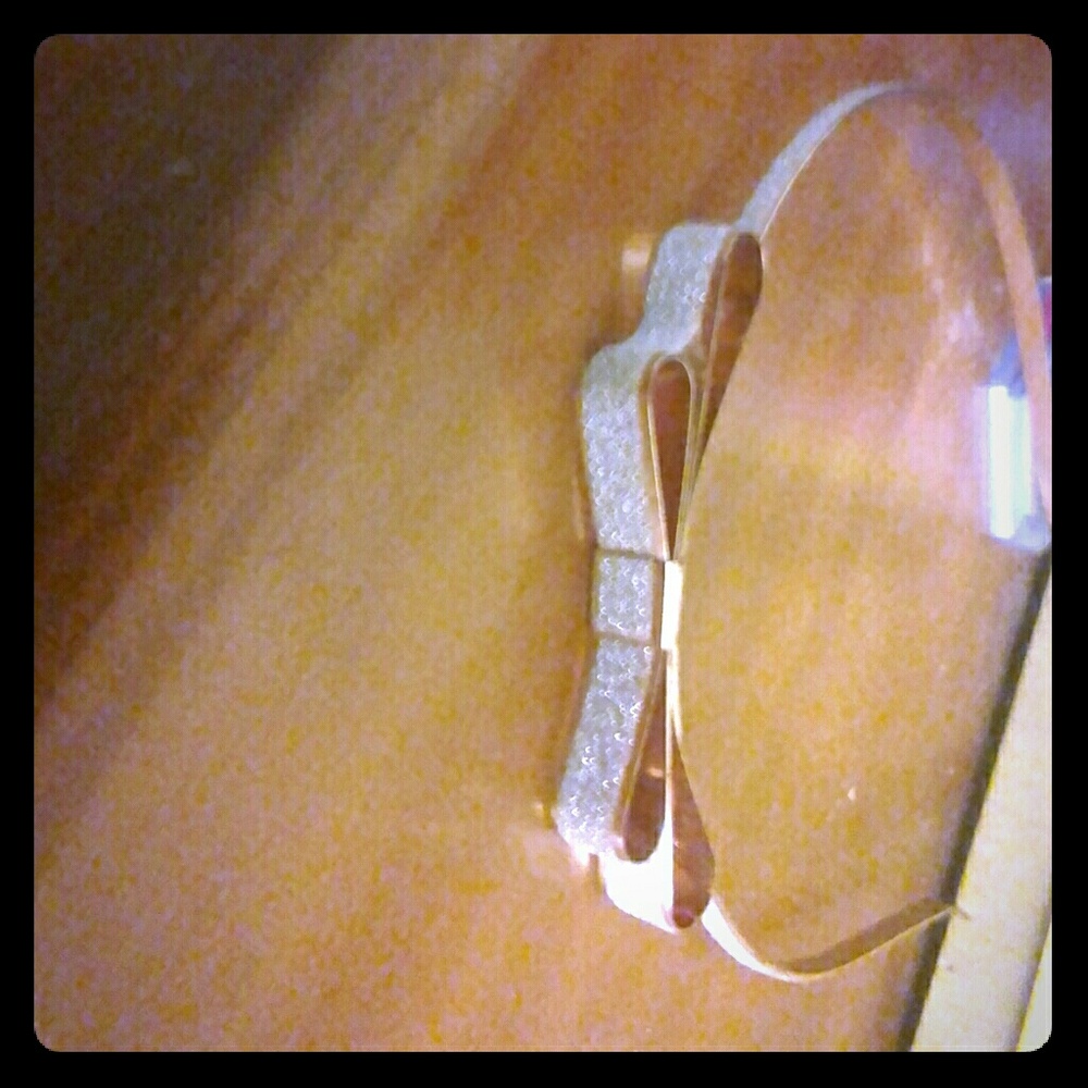 I am selling a gold and glitter headband