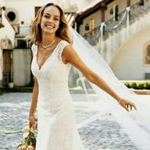 Gorgeous all over beaded lace wedding gown.