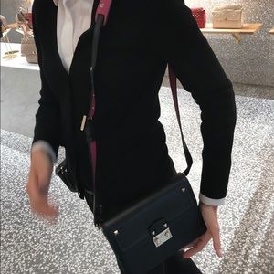 Valentino black bag with pink shoulder strap
