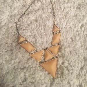 Tan geometric statement necklace