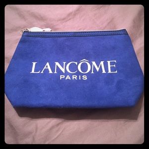 Blue suede Lancôme makeup bag
