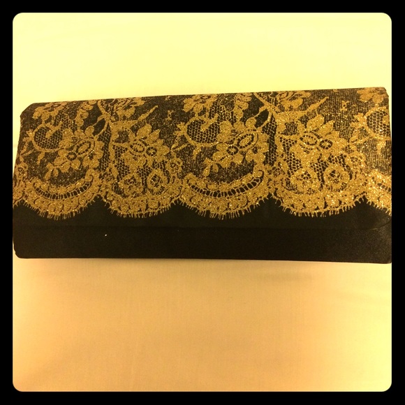 Handbags - NIB Gold & Black Clutch