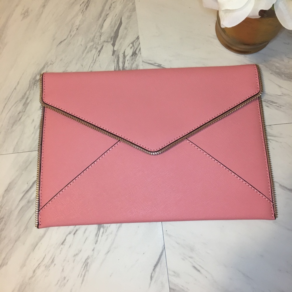Leo envelope clutch .color Guava authentic