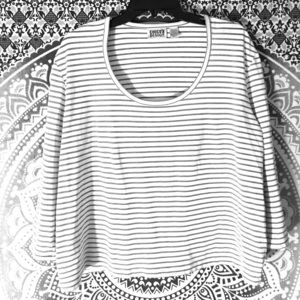 3/4 sleeve white and black lined crop top.