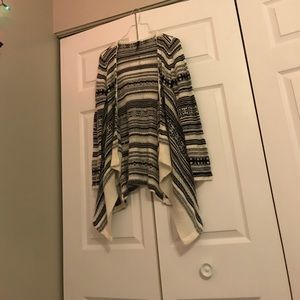 Black and white design on knitted cardigan