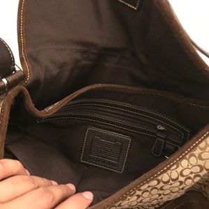 Shoulder Coach brown purse.