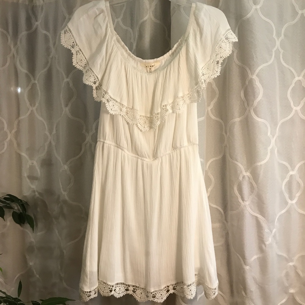 Super cute off the shoulder lace tier dress