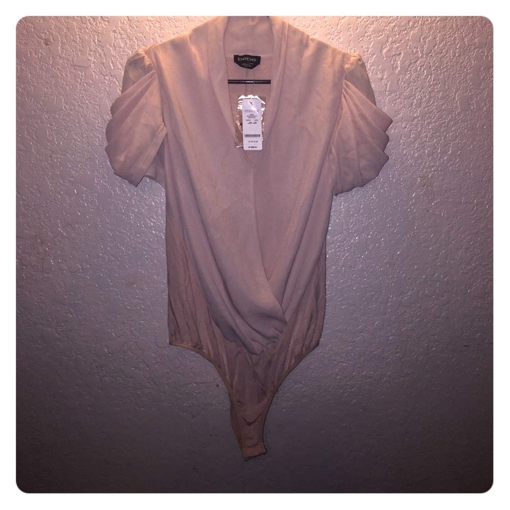 Bebe body suit low cut puffy sleeves NWT
