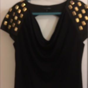 Black dress with gold metal grommets on shoulder