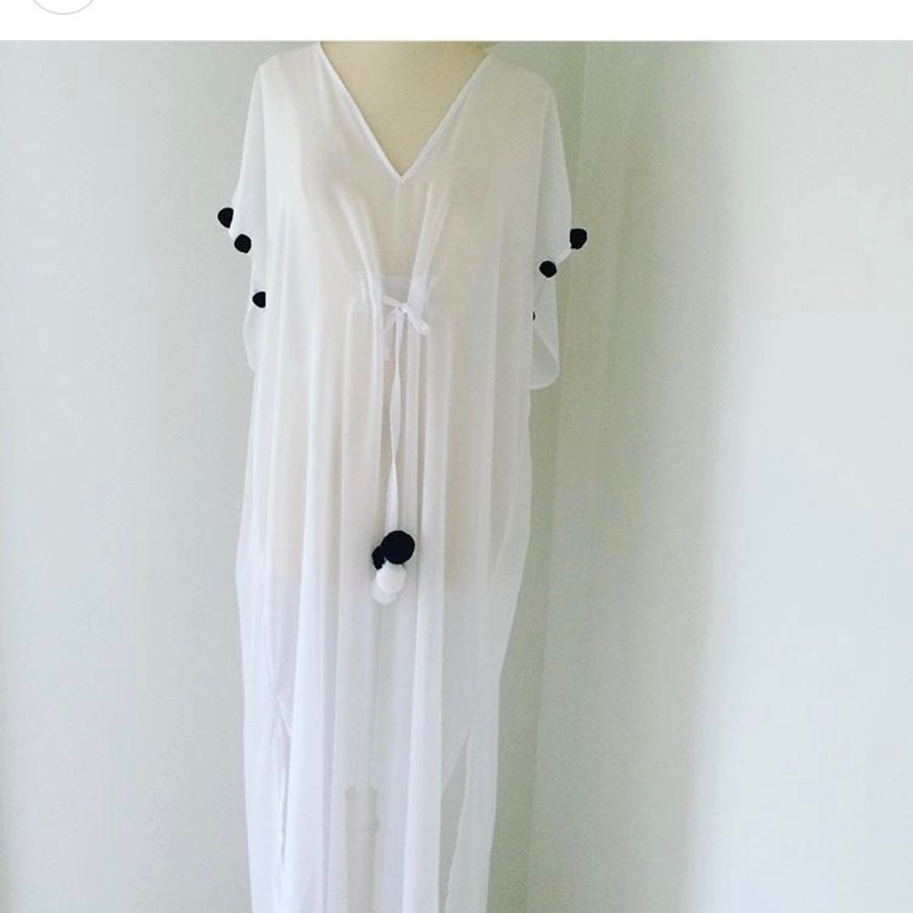 white beach cover up with black & white pompons
