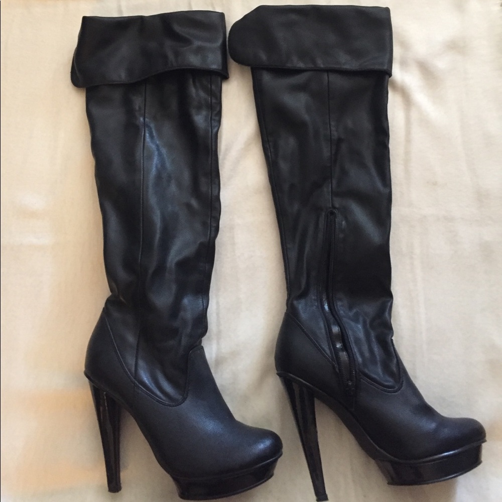Over the knee black leather boots