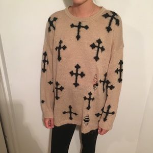 Cross sweater