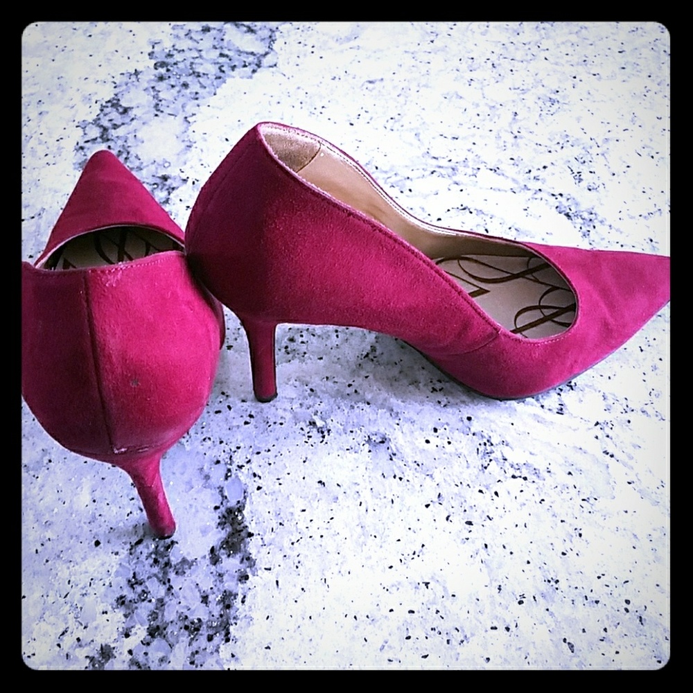 Red suede pumps