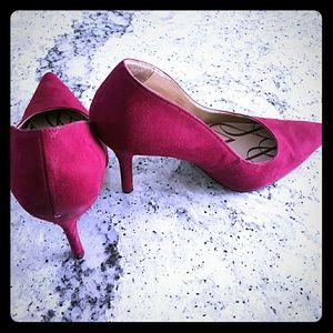 Red suede pumps