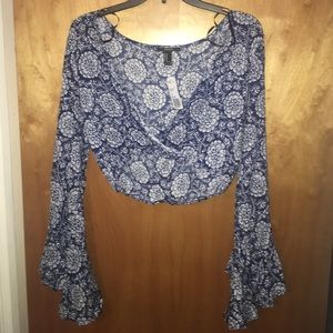 Long sleeved blue flowery crop top