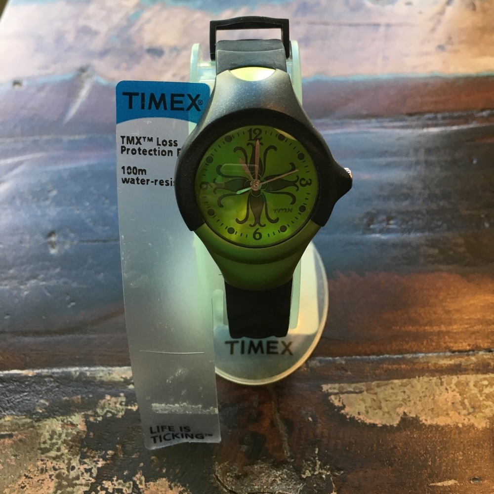 Times watch with original papers.