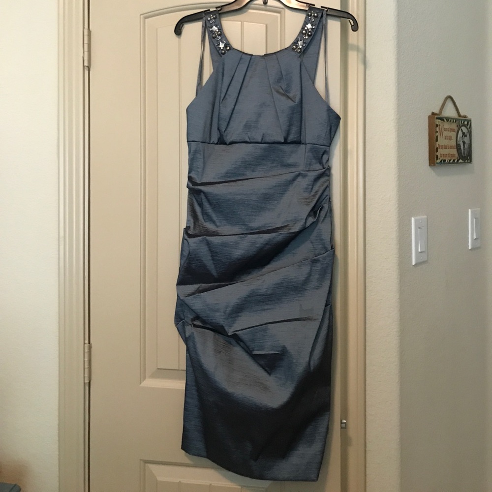 Fitted dress with beaded neckline