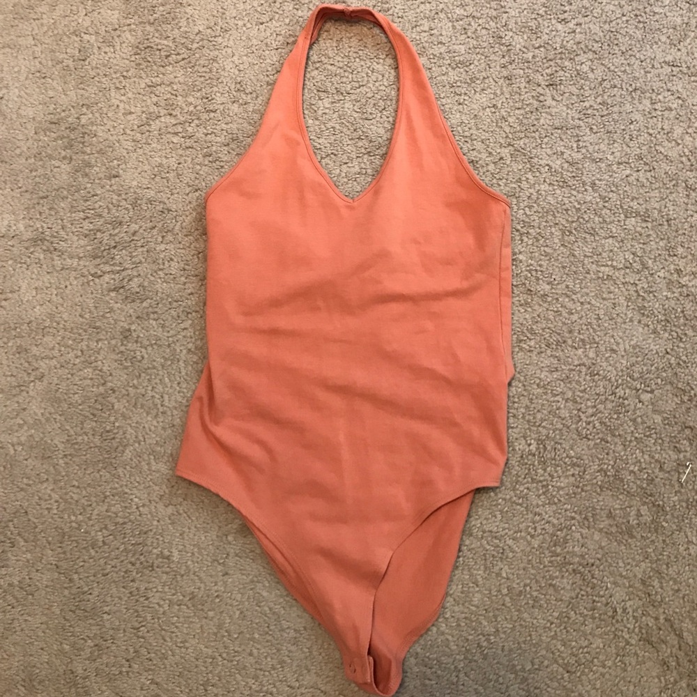 orange body suit