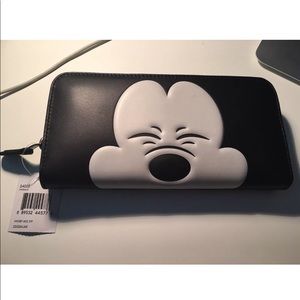 Coach Mickey Mouse zip around checkbook wallet