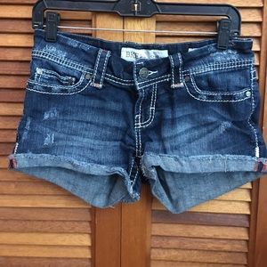 BKE jean shorts with salmon/pink/orange accents