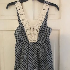 Precious boutique top with lots of detail