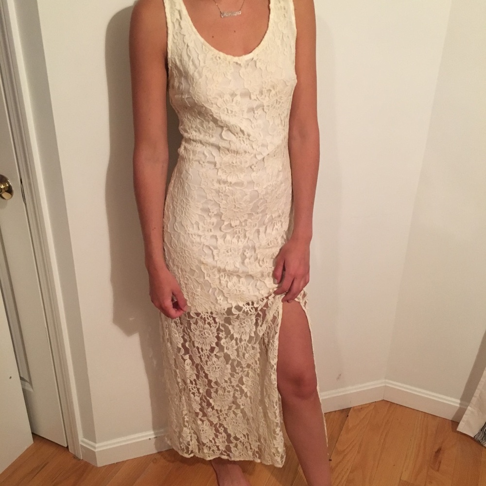Cream lace maxi dress with v back.